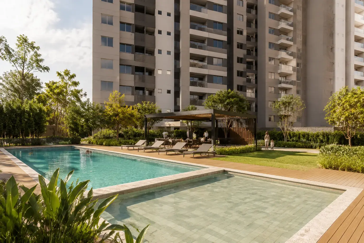 Área de lazer central do Reserva do Vale com piscina e deck de madeira